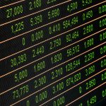 Detailed view of a stock market screen showing numbers and data, symbolizing financial trading.
